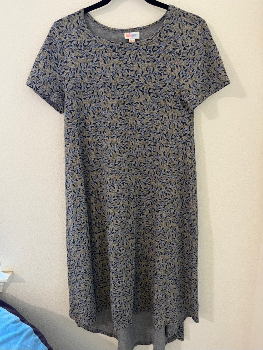 LuLaRoe Carly dress with  a gray base and Minnie Mouse print on